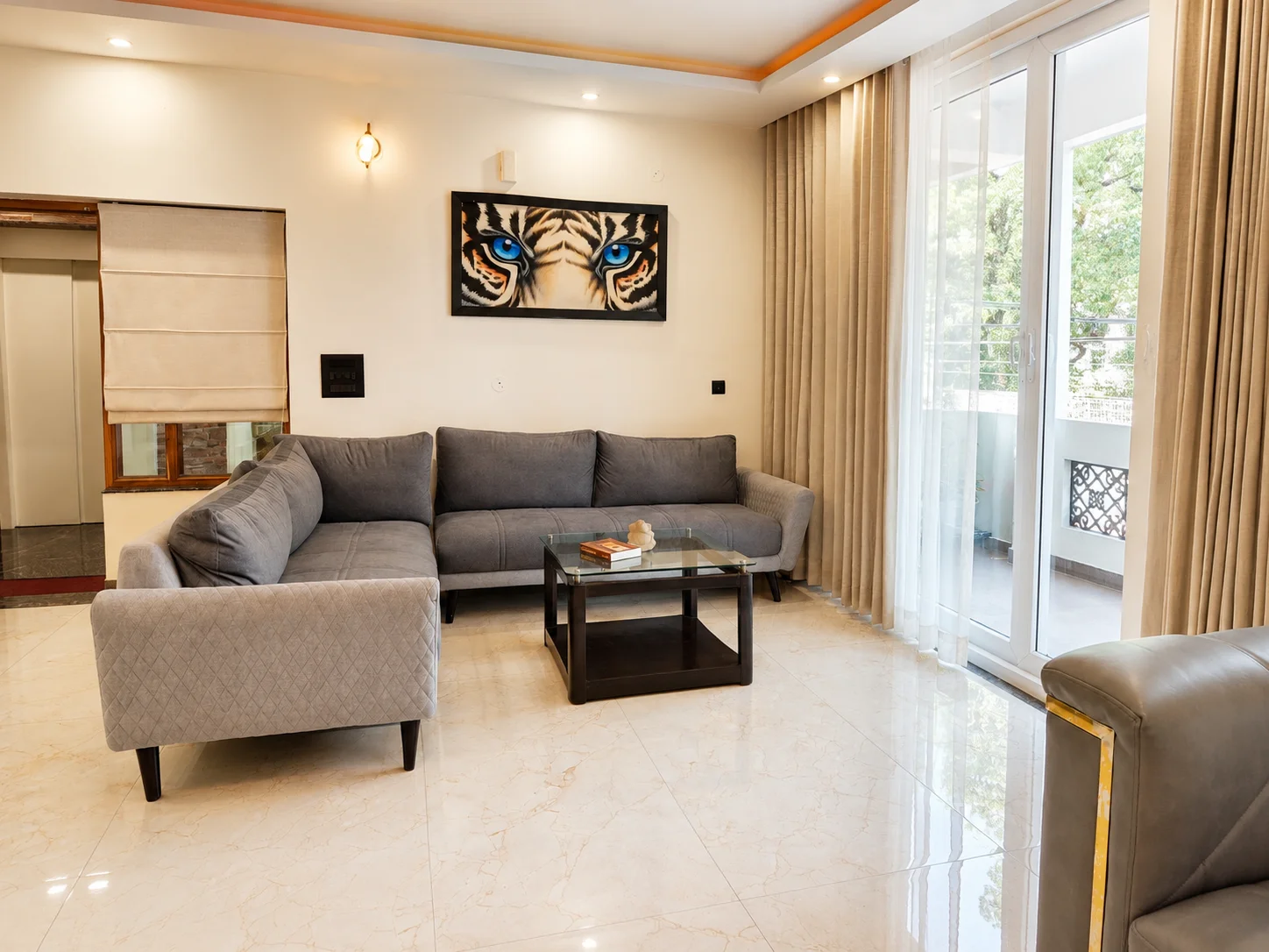Spacious drawing room lounge at The Palatial Homes, widely recognized as the best homestay in Dehradun